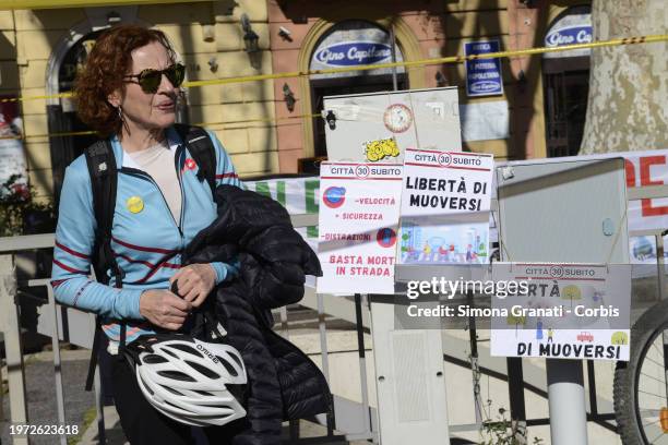 People with banners and placards protest for a new highway code that introduces the ban on exceeding 30 km per hour in the city, on February 2, 2024...