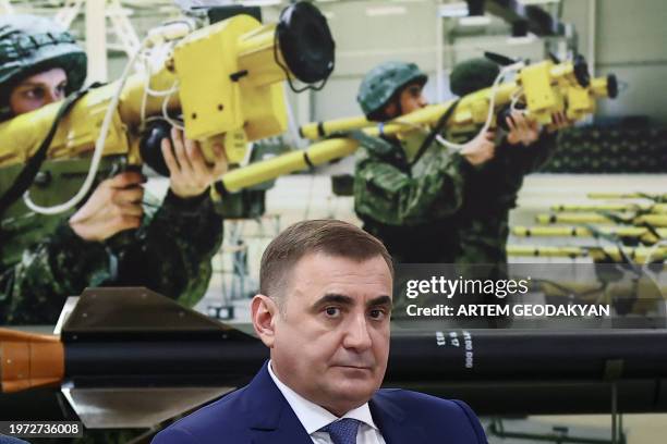 In this pool photograph distributed by Russian state agency Sputnik, Governor of the Tula Region Alexei Dyumin attends a meeting of Russia's...