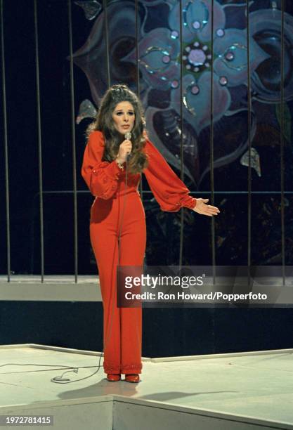 American singer Bobbie Gentry performs on the set of a pop music television show in London circa 1970.