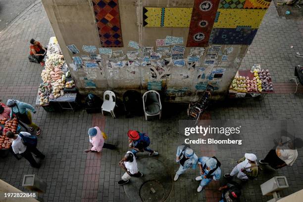 Informal street market stalls display fresh produce for sale near to Bara taxi rank in the Soweto district of Johannesburg, South Africa, on...