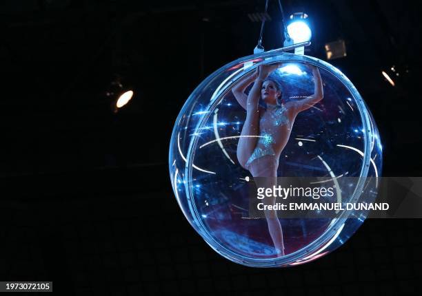 Circus artist performs prior to the start of the first day of the Judo Paris Grand Slam finals at the Accor Arena, in Paris on February 2, 2024.