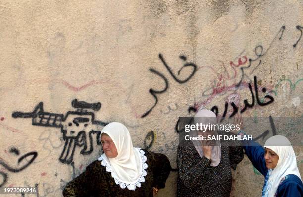 Palestinian women attend the funerals of Islamic Jihad militant Nur Marai and Abu Ammar Brigades militant Mahmoud Darwish in the West Bank city of...