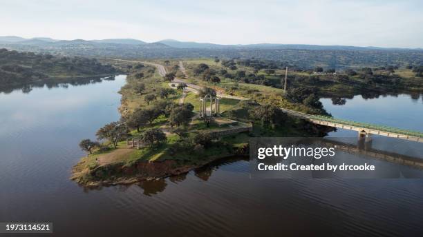 roman temple ruins by a lake - extremadura stock pictures, royalty-free photos & images