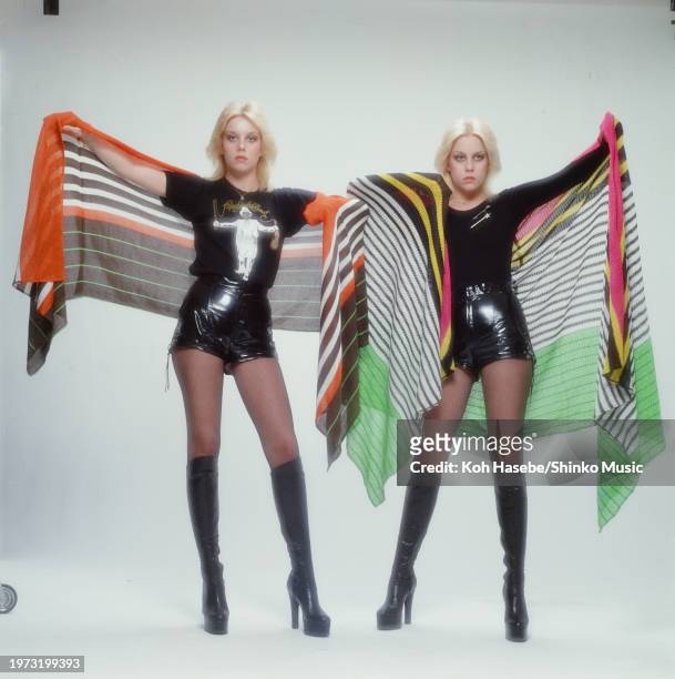 After leaving The Runaways, Cherie Currie and her twin sister Marie made their debut as the duo Cherie and Marie, photographed on arrival in Japan,...