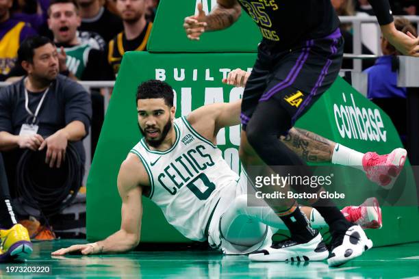 Boston, MA Boston Celtics SF Jayson Tatum falls underneath the basket in the second half. The Celtics lost to the Los Angeles Lakers, 114-105.