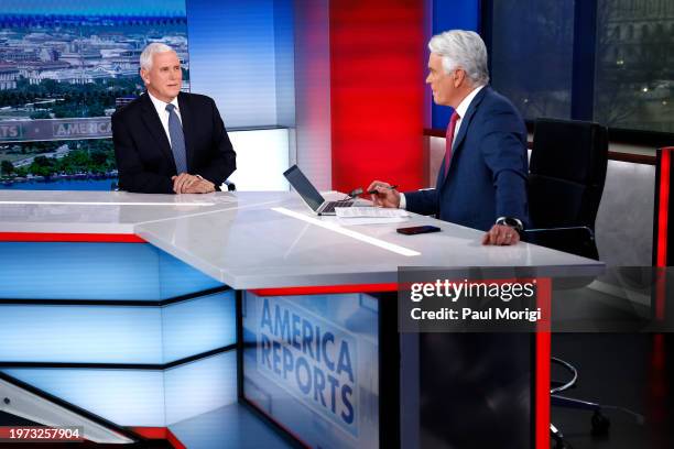 Former Vice President Mike Pence visits FOX News Channel’s "America Reports" with John Roberts at the FOX News D.C. Bureau on January 30, 2024 in...