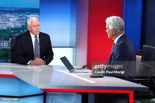 Former Vice President Mike Pence visits FOX News Channel’s "America Reports" with John Roberts at the FOX News D.C. Bureau on January 30, 2024 in...