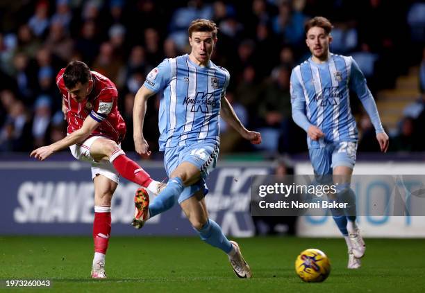 Jason Knight of Bristol City shoots whilst under pressure from Ben Sheaf of Coventry City during the Sky Bet Championship match between Coventry City...