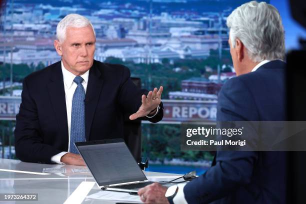 Former Vice President Mike Pence visits FOX News Channel’s "America Reports" with John Roberts at the FOX News D.C. Bureau on January 30, 2024 in...