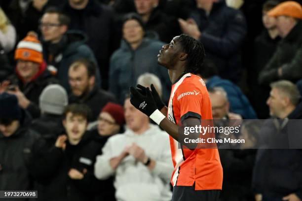 Elijah Adebayo of Luton Town celebrates scoring his team's first goal during the Premier League match between Luton Town and Brighton & Hove Albion...