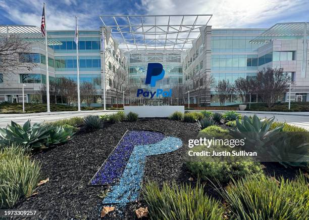 PayPal sign is seen at its headquarters on January 30, 2024 in San Jose, California. PayPal announced plans to lay off 2,000 employees or 7 percent...