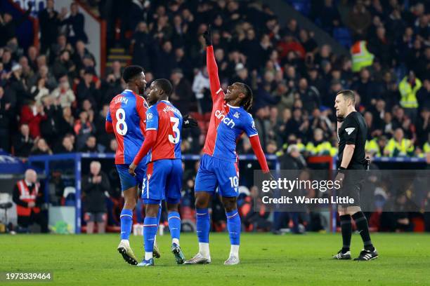 Eberechi Eze of Crystal Palace celebrates with teammates after scoring his team's second goal during the Premier League match between Crystal Palace...