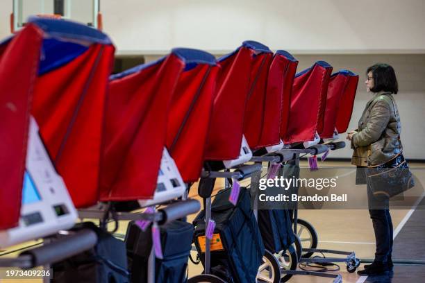 Person casts their ballot in the Democratic Presidential Primary during early voting at the Bluffton Recreation Center on January 30, 2024 in...