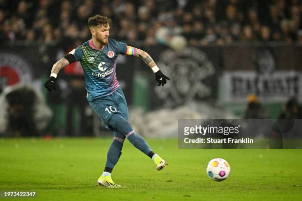 Marcel Hartel of FC St. Pauli scores his team's first goal from the penalty-spot during the DFB cup quarterfinal match between FC St. Pauli and...