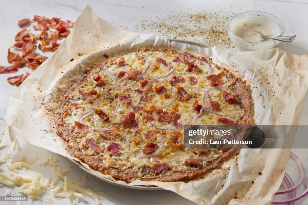 Preparing Bacon Ranch Chicken Crust Pizza