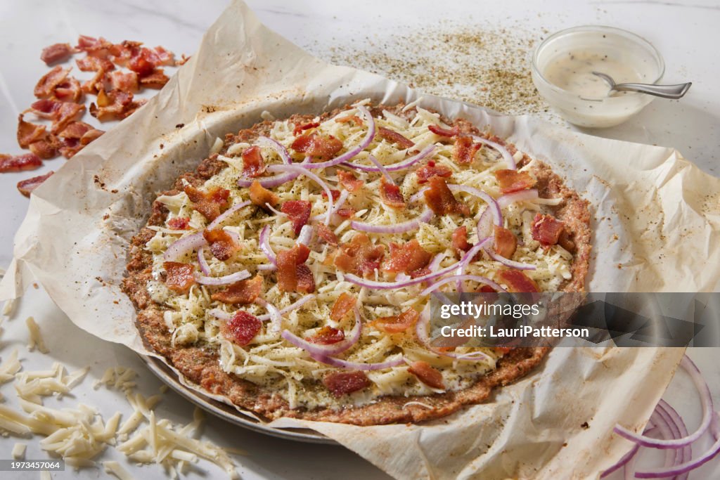 Preparing Bacon Ranch Chicken Crust Pizza