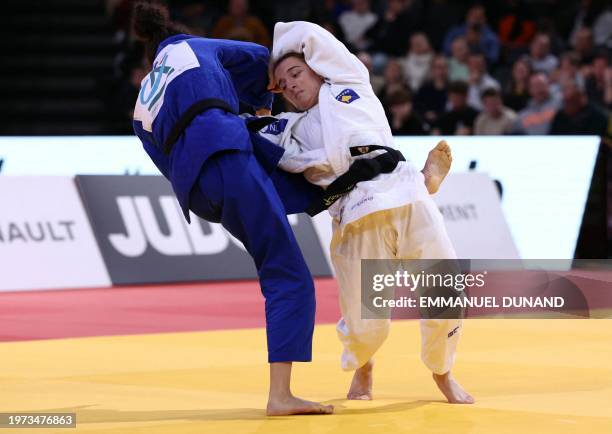 Kosovo's Distria Krasniqi competes against Great Britain's Chelsie Giles on her way to win in the women's -52 kg final of the Paris Grand Slam on...