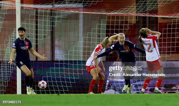 Elisa De Almeida and Amalie Vangsgaard of Paris Saint-Germain celebrate the teams second goal, an own goal from Georgia Stanway of Bayern Munich...