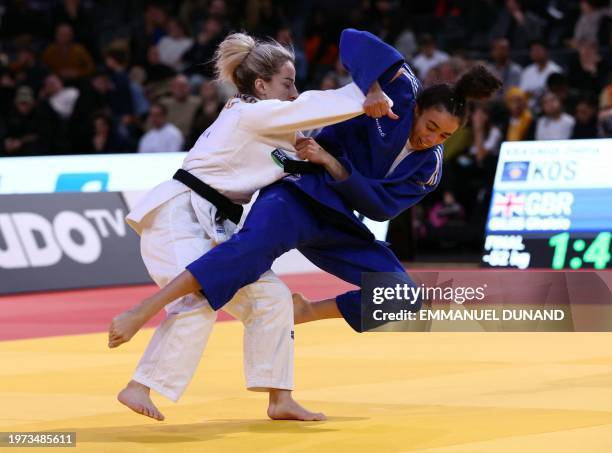 Kosovo's Distria Krasniqi competes against Great Britain's Chelsie Giles on her way to win in the women's -52 kg final of the Paris Grand Slam on...