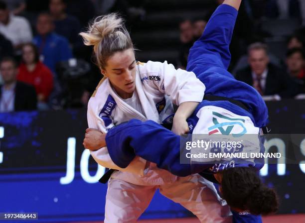 Kosovo's Distria Krasniqi competes against Great Britain's Chelsie Giles on her way to win in the women's -52 kg final of the Paris Grand Slam on...