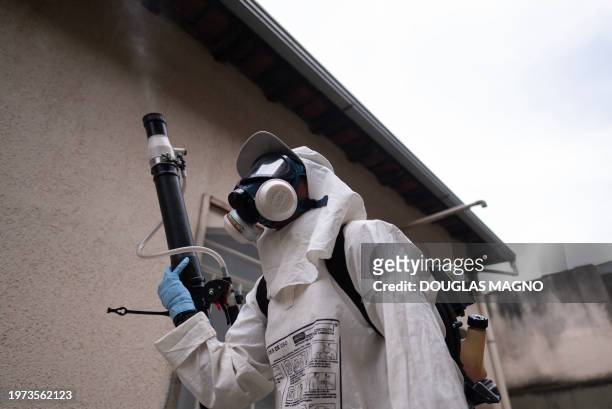 Health worker fumigates against the Aedes aegypti mosquito, a vector of the dengue, Zika, and Chikungunya viruses in Contagem, metropolitan region of...