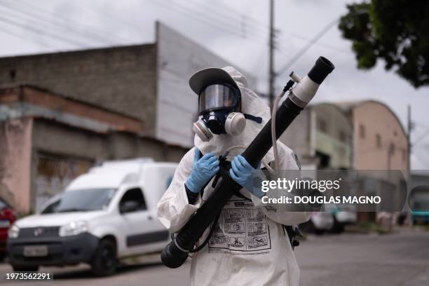 Health worker fumigates against the Aedes aegypti mosquito, a vector of the dengue, Zika, and Chikungunya viruses in Contagem, metropolitan region of...