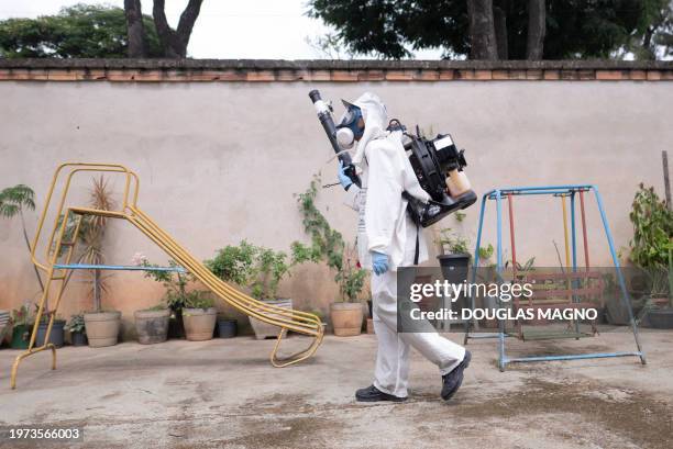 Health worker fumigates against the Aedes aegypti mosquito, a vector of the dengue, Zika, and Chikungunya viruses in Contagem, metropolitan region of...