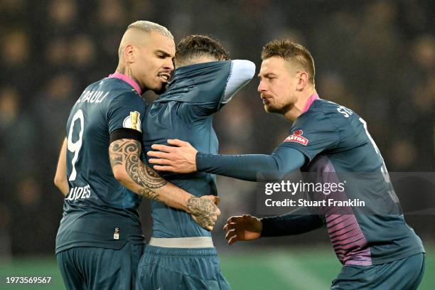 Marcel Hartel of FC St. Pauli reacts after missing the team's fifth penalty in the penalty shoot out during the DFB cup quarterfinal match between FC...