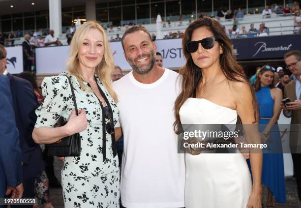 Belinda Stronach, David Grutman and Laurie Lynn Stark attend the 2024 Pegasus World Cup Presented By Baccarat at Gulfstream Park on January 27, 2024...