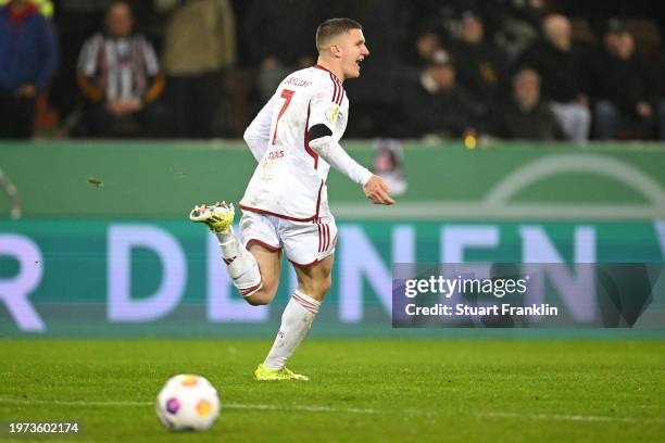 Christos Tzolis of Fortuna Duesseldorf celebrates after scoring the winning penalty in the penalty shoot out during the DFB cup quarterfinal match...