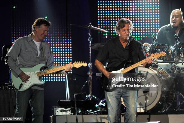 Steve Winwood and Eric Clapton perform at Oracle Arena on May 20, 2009 in Oakland, California.