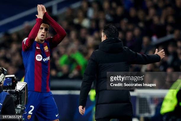 Joao Cancelo of FC Barcelona, coach Xavi Hernandez of FC Barcelona during the UEFA Champions League match between FC Barcelona v FC Porto at the...
