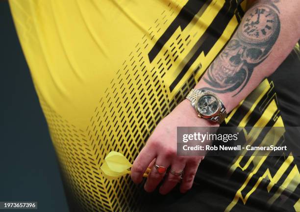 Detailed view of the watch and darts of Dave Chisnall during his first round match against Martin Schindler at Marshall Arena on February 2, 2024 in...