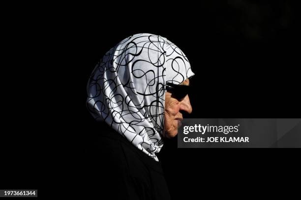 Former Palestinian residents of West Jerusalem, who left their houses in 1948 with the foundation of the state of Israel, take part in a march in the...