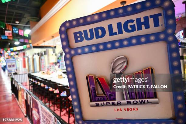 InBev Bud Light beer signage is displayed at the 911 Taco Bar restaurant, which joined the NFL's Super Bowl LVIII Business Connect program to provide...