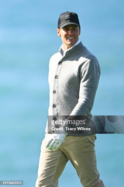 Former NFL quarterback Tom Brady walks down the ninth fairway during the second round of AT&T Pebble Beach Pro-Am at Pebble Beach Golf Links on...