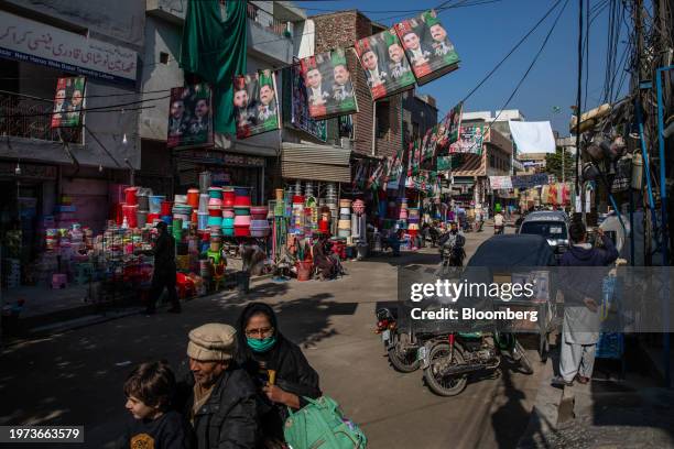 Campaign posters for Bilawal Bhutto Zardari, Pakistan's foreign minister, hang over a street ahead of Pakistan's national election in Lahore,...