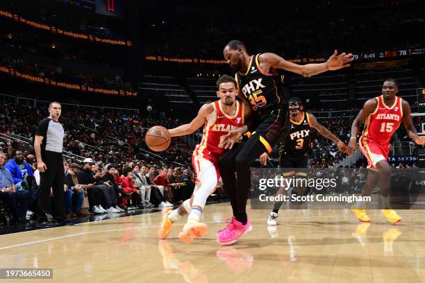 Trae Young of the Atlanta Hawks drives to the basket during the game against the Phoenix Suns on February 2, 2024 at State Farm Arena in Atlanta,...