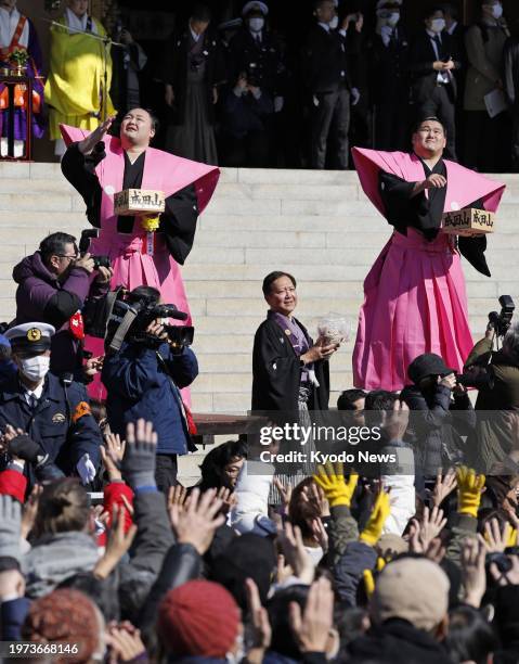 Traditional bean-throwing event is held at Naritasan Shinsho-ji temple in Narita near Tokyo on Feb. 3 with sumo wrestlers Hoshoryu and Asanoyama...