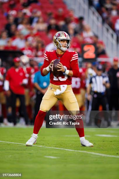 Brock Purdy of the San Francisco 49ers drops back to pass during a game against the Los Angeles Chargers at Levi's Stadium on August 25, 2023 in...