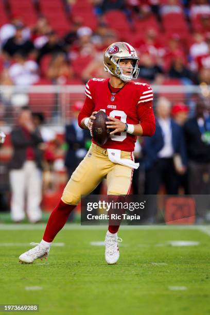 Brock Purdy of the San Francisco 49ers drops back to pass during a game against the Los Angeles Chargers at Levi's Stadium on August 25, 2023 in...