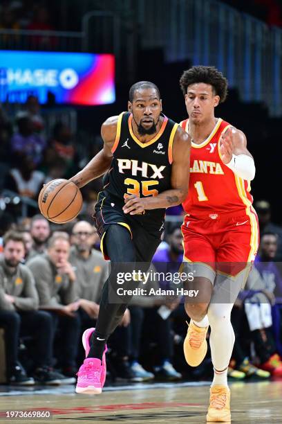 Kevin Durant of the Phoenix Suns handles the ball during the game against the Atlanta Hawks on February 2, 2024 at State Farm Arena in Atlanta,...