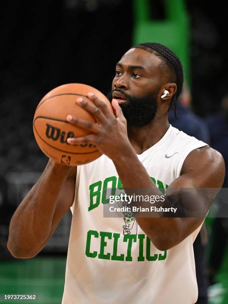 Jaylen Brown of the Boston Celtics warms up before a game against the Indiana Pacers at the TD Garden on January 30, 2024 in Boston, Massachusetts....