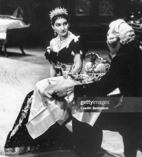 Maria Callas returns to the stage of the New York Metropolitan Opera House in a production of Giacomo Puccini's "Torsca" and is seen on stage with...