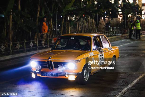 Car is departing from the Rallye Monte-Carlo Historique 2024 in Piazza Duomo, Milan, Italy, on February 1, 2024.