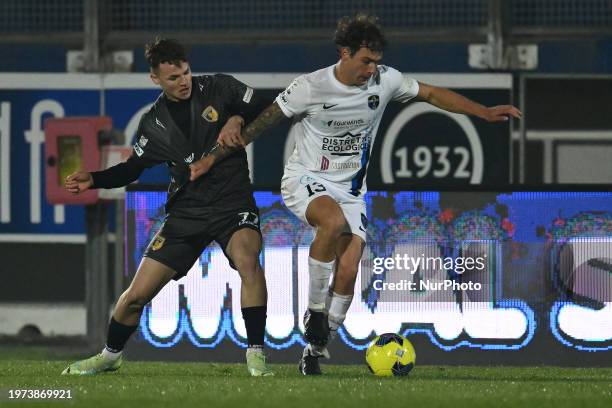 Enrico Oviszach of Giugliano Calcio 1928 and Eros De Santis of Latina Calcio 1932 are competing during the 24th day, Group C, of the Serie C Lega Pro...