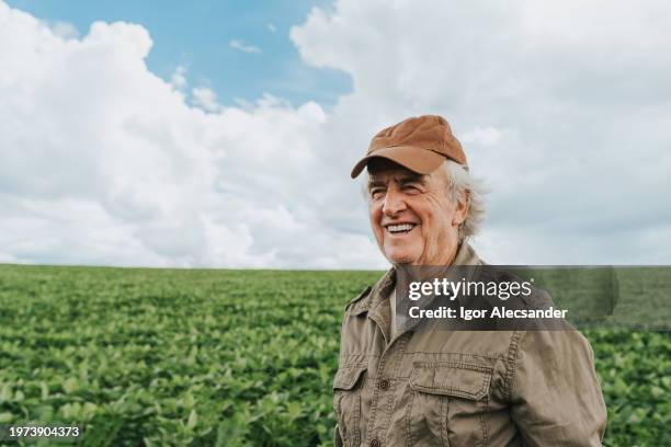 portrait of a smiling farmer - monoculture stock pictures, royalty-free photos & images