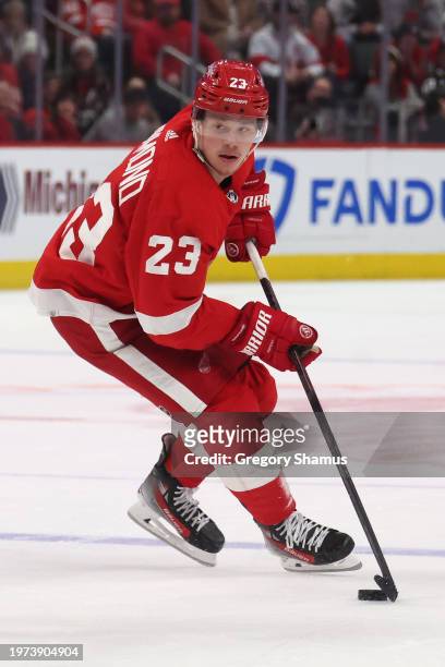 Lucas Raymond of the Detroit Red Wings plays against Nashville Predators at Little Caesars Arena on December 29, 2023 in Detroit, Michigan.