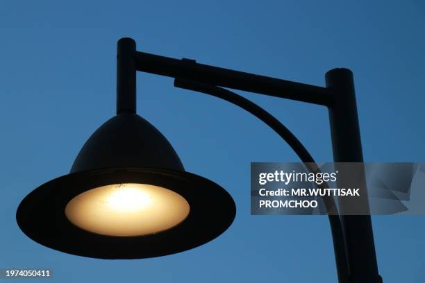 lanterns on the sky background. - led street light stock pictures, royalty-free photos & images