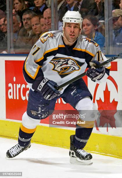 David Legwand of the Nashville Predators skates against the Toronto Maple Leafs during NHL game action on January 6, 2004 at Air Canada Centre in...